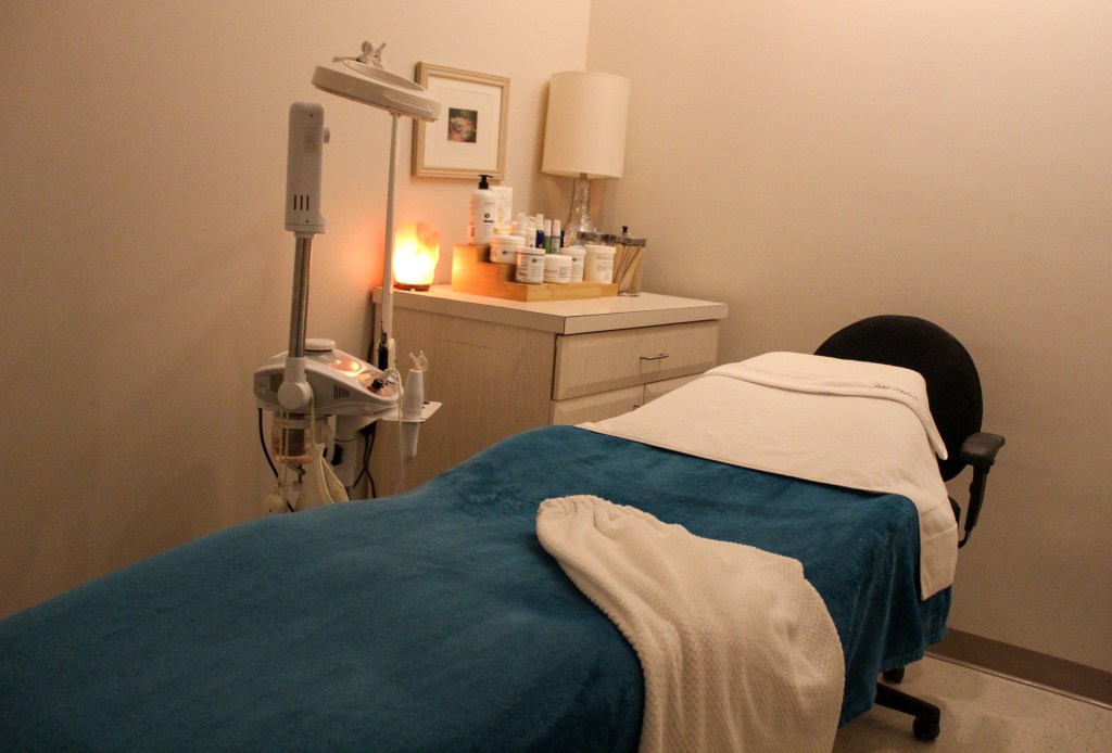 Esthetic table for facials, waxing and lash treatments.